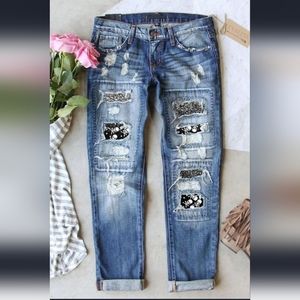 Sky blue acid wash distressed skull jeans